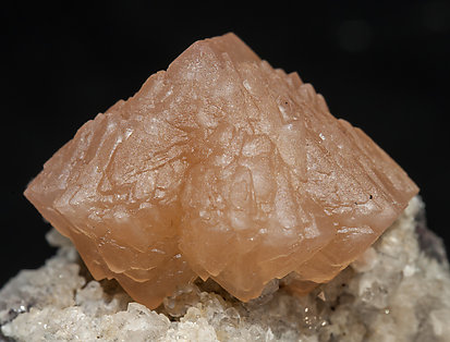 Olmiite with Calcite.