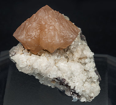 Olmiite with Calcite.