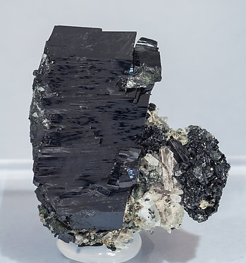 Augite with Quartz and Mica.