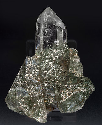 Quartz with Rutile, Chlorite and Mica.