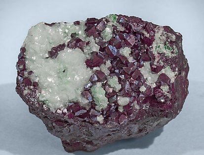 Cuprite with Dolomite (variety cuprian) and Adamite (variety cuprian). 