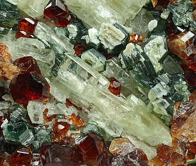 Grossular (variety hessonite) with Diopside. 