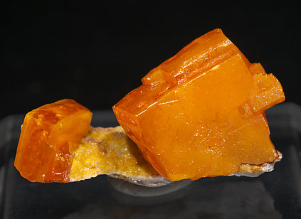 Wulfenite with As rich Vanadinite and Calcite.