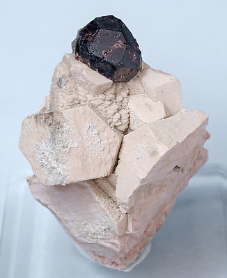 Almandine-Spessartine (Series) with Orthoclase.