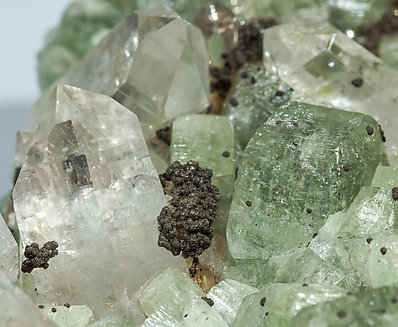 Arsenopyrite with Pyrite, Fluorapatite and Siderite. 