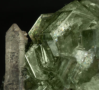 Fluorapatite with Quartz, Arsenopyrite, Muscovite and Chlorite. 