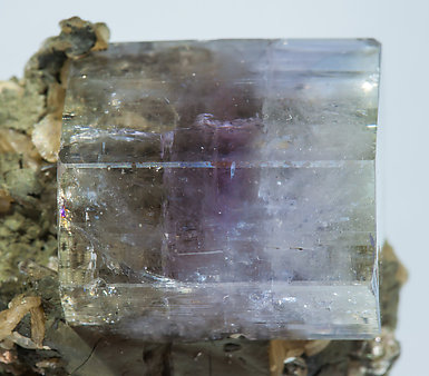 Fluorapatite with Siderite, Muscovite and Chlorite. 