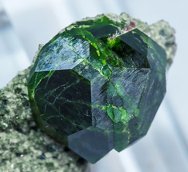 Andradite (variety demantoid) with Diopside. 