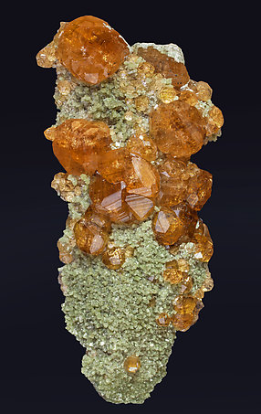 Grossular (variety hessonite) with Diopside.