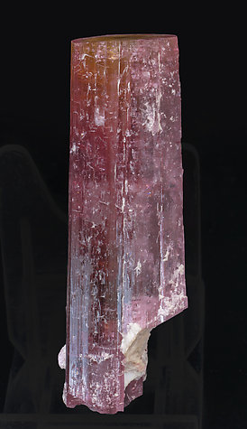 Elbaite (variety rubellite) with Mica and Feldspar. Side