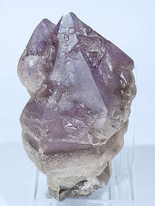 Quartz (variety amethyst) with Quartz (variety smoky) and Microcline. Front