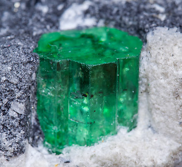 Beryl (variety emerald) with Calcite. 