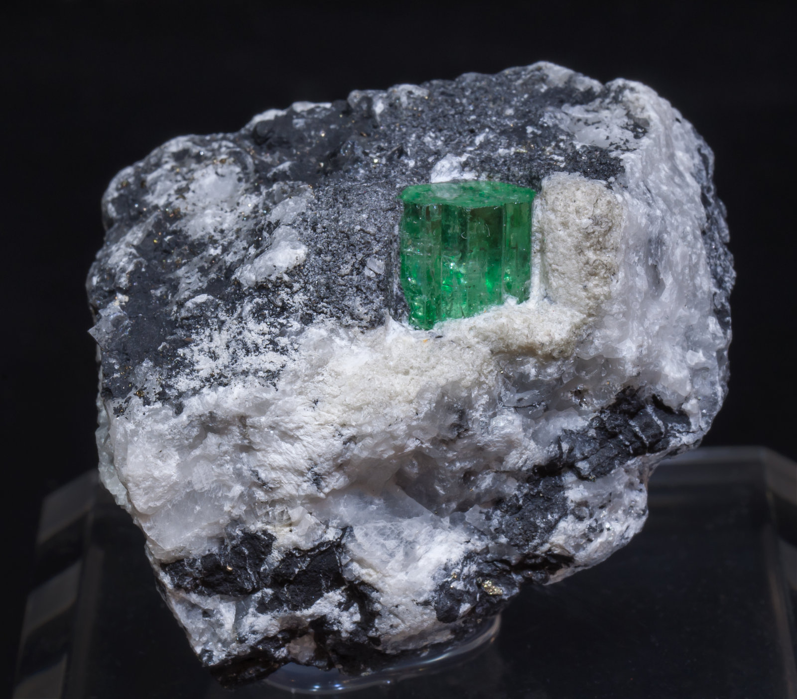 Beryl (variety emerald) with Calcite Muzo mining district, Western
