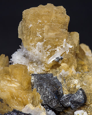 Roweite with Olshanskyite, Magnetite and Andradite. 