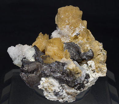 Roweite with Olshanskyite, Magnetite and Andradite. Rear
