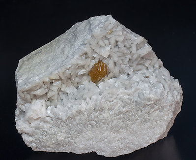 Hydroxylbastnäsite-(Ce) and Dolomite.