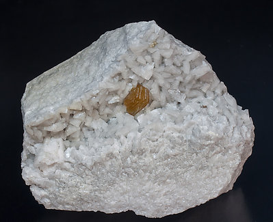 Hydroxylbastnsite-(Ce) and Dolomite.