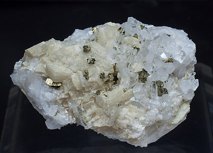 Chalcopyrite with Quartz, Dolomite and Calcite.