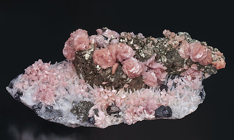 Rhodochrosite with Pyrite, Quartz and Sphalerite.