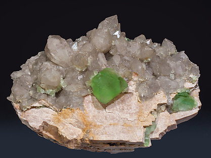 Octahedral Fluorite with Quartz (variety smoky) and Microcline.