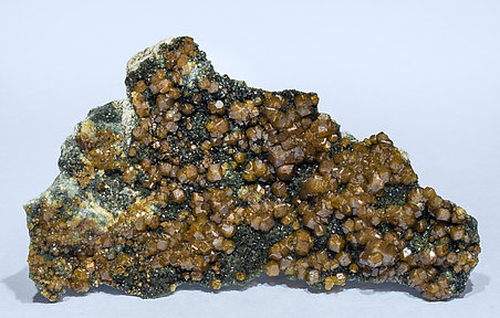 Andradite (variety topazolite) with Clinochlore. Front