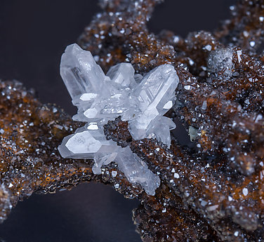 Cerussite on Quartz with Goethite inclusions. 