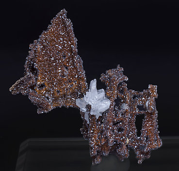 Cerussite on Quartz with Goethite inclusions.