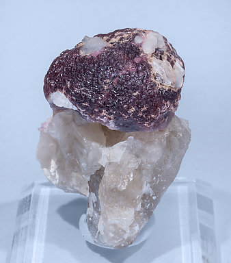 Elbaite (variety rubellite) with Quartz.