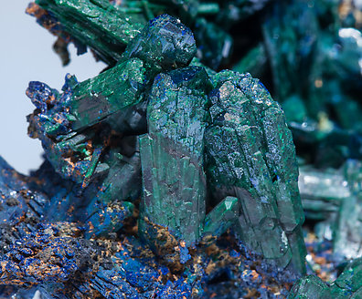 Malachite after Azurite with Azurite. 