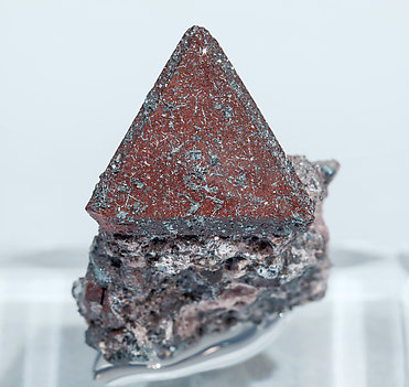 Zunyite with Hematite. 