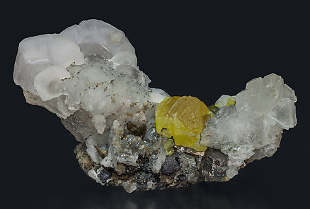 Sphalerite with Calcite, Quartz, Arsenopyrite and Sphalerite.