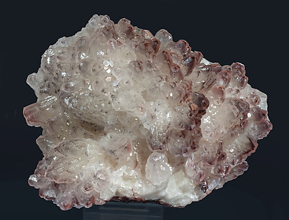 Calcite with Hematite inclusions.