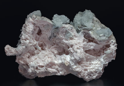 Baryte with Rhodochrosite epimorphic on Calcite. Rear
