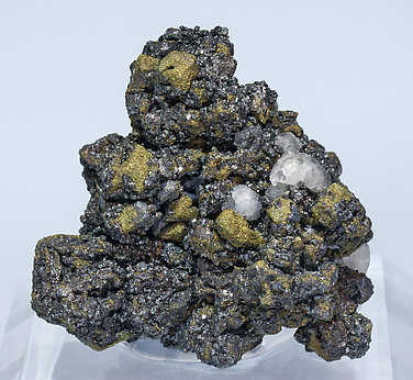 Acanthite (Se-bearing) with Polybasite (Se-bearing) and Calcite.