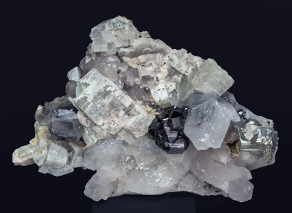 Cassiterite with Quartz, Fluorapatite and Arsenopyrite.