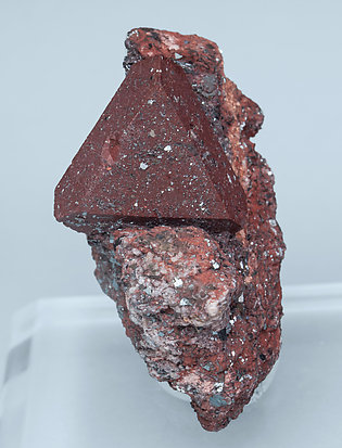 Zunyite with Hematite. 