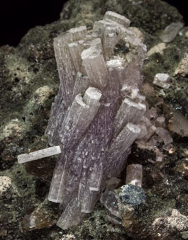 Fluorapatite with Quartz, Sphalerite, Muscovite and Chlorite. 