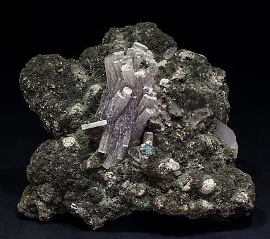 Fluorapatite with Quartz, Sphalerite, Muscovite and Chlorite.