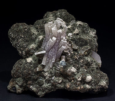 Fluorapatite with Quartz, Sphalerite, Muscovite and Chlorite. 