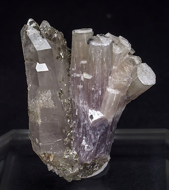 Fluorapatite with Quartz, Muscovite and Chlorite.