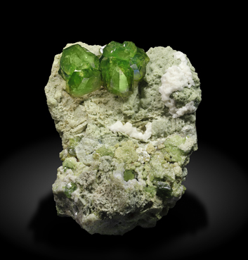 Andradite (variety demantoid) with Calcite.