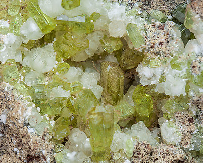 Fluorapatite with Calcite and Hematite. 