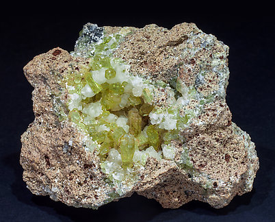 Fluorapatite with Calcite and Hematite.