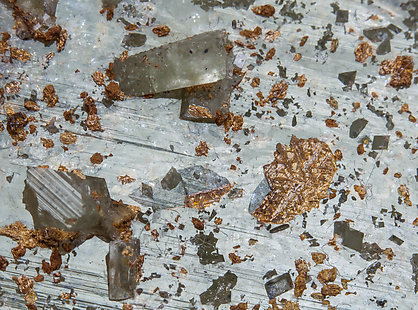 Ba-rich Microcline (variety hyalophane) with Rutile inclusions. 