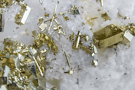 Pyrite with Quartz, Calcite-Dolomite and Muscovite. 