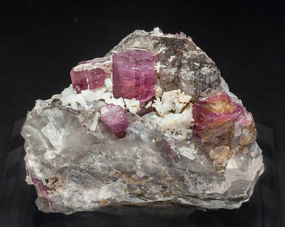 Elbaite-Schorl Series (variety rubellite) with Quartz and Feldspar. 