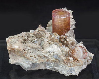 Elbaite-Schorl Series (variety rubellite) with Quartz and Feldspar.