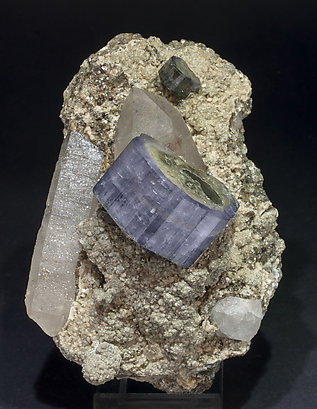 Fluorapatite with Quartz, Siderite, Muscovite and Chlorite.
