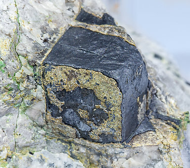 Ullmannite (As-bearing) with Calcite. 