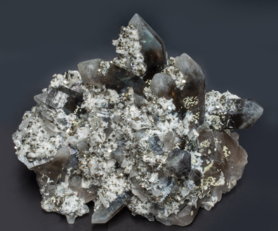 Bertrandite with Quartz (variety smoky) and Pyrite. Front